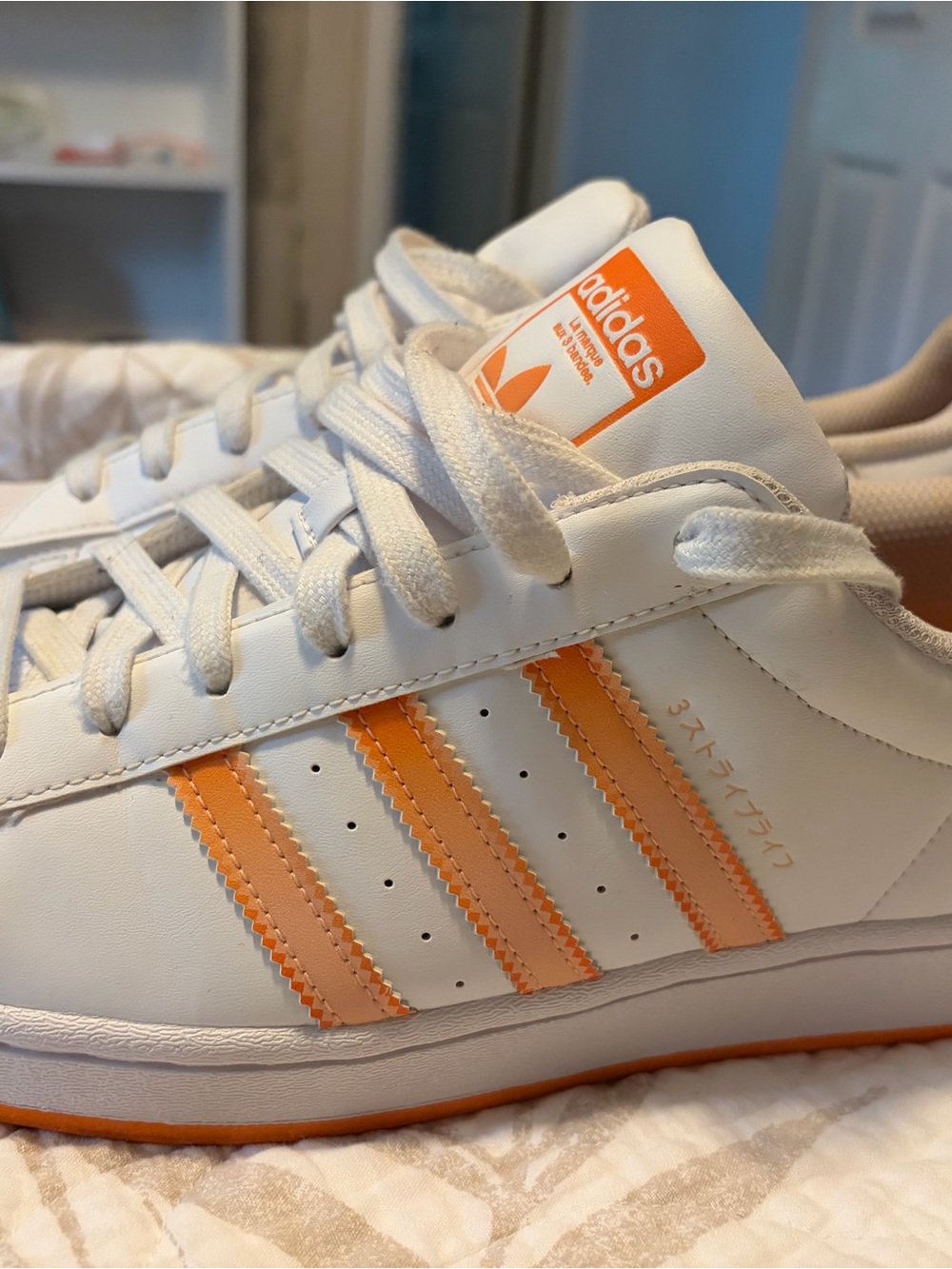 Adidas white and orange superstar shoes men’s